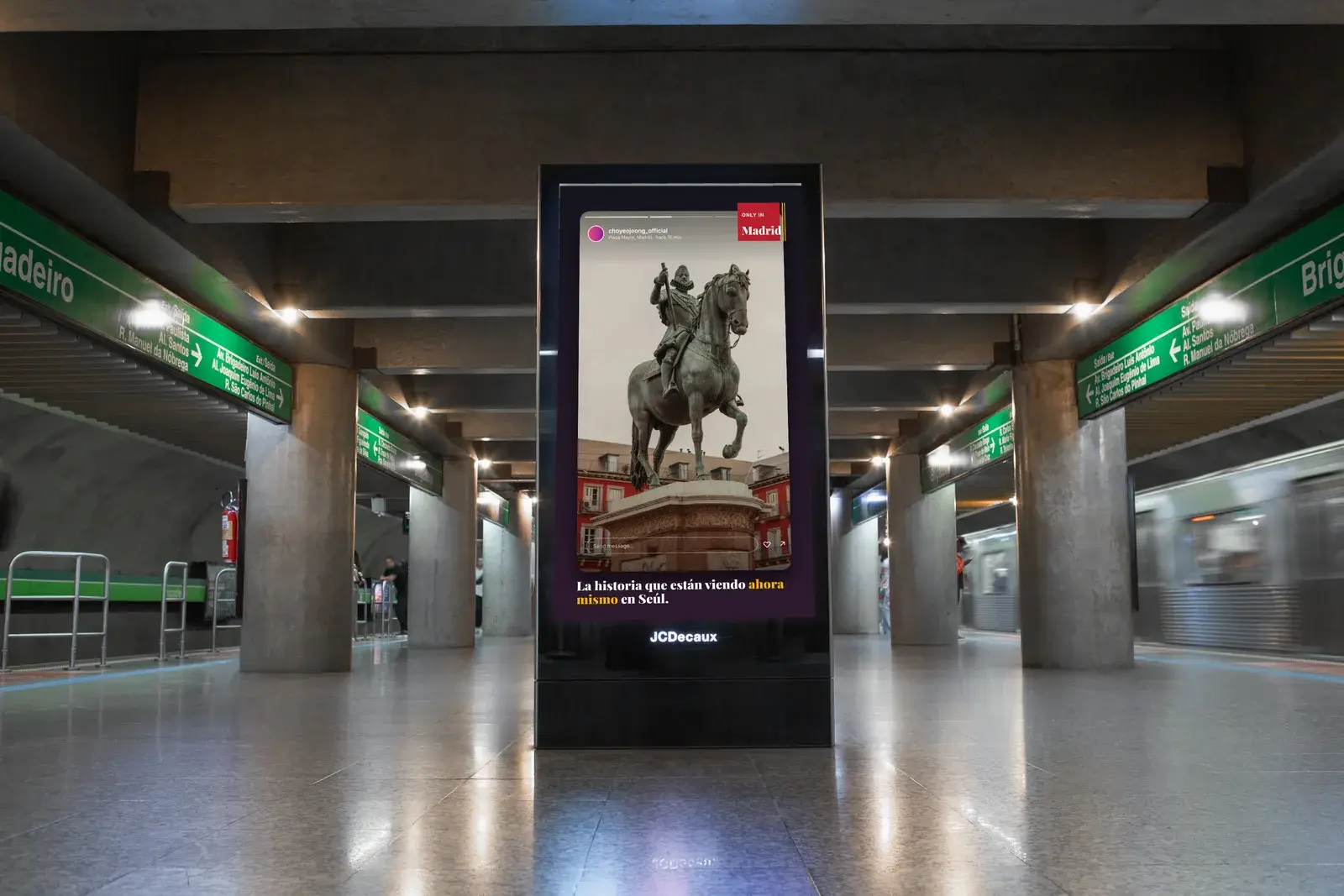 Digital out-of-home screen in a busy metro station